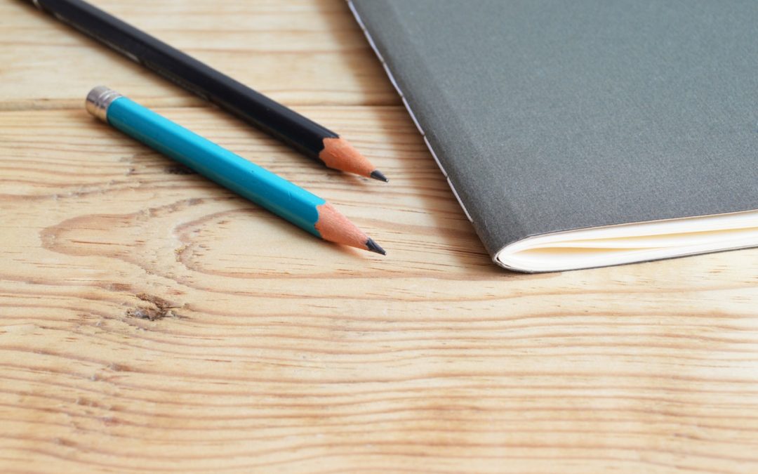Two Pencils Near book by Skitterphoto for Pexels